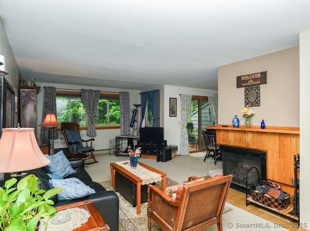 172 Old Farms Rd Unit 172, Torrington, CT 06790 - living room featuring a fireplace and healthy amount of natural light