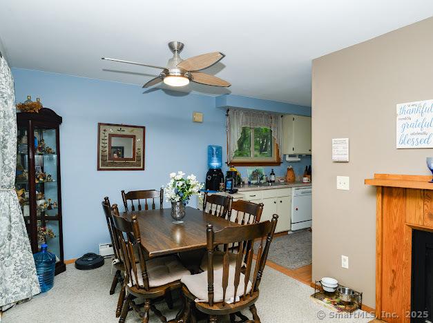 172 Old Farms Rd Unit 172, Torrington, CT 06790 - dining area featuring ceiling fan and a baseboard heating unit