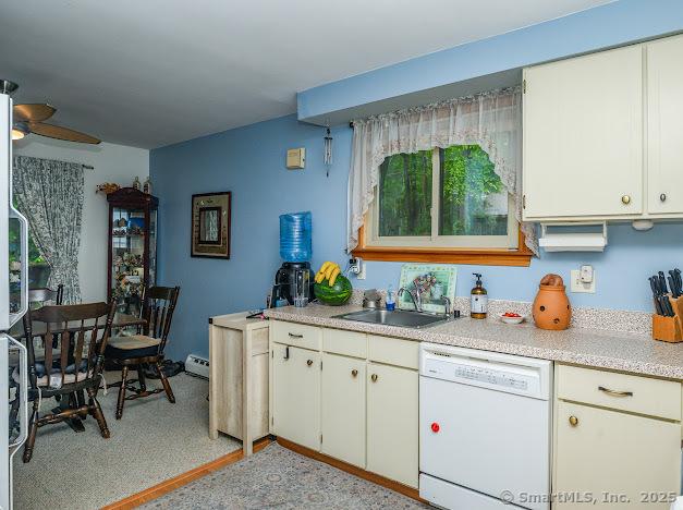 172 Old Farms Rd Unit 172, Torrington, CT 06790 - kitchen featuring dishwasher, light countertops, a ceiling fan, baseboard heating, and white cabinets