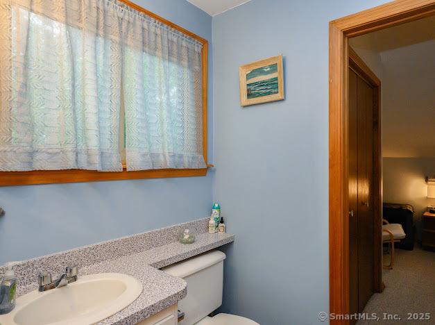 172 Old Farms Rd Unit 172, Torrington, CT 06790 - bathroom featuring toilet and vanity