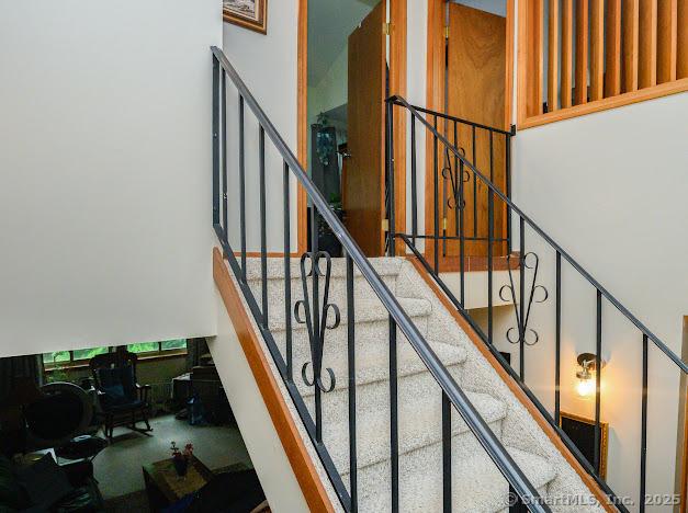172 Old Farms Rd Unit 172, Torrington, CT 06790 - stairway with a high ceiling