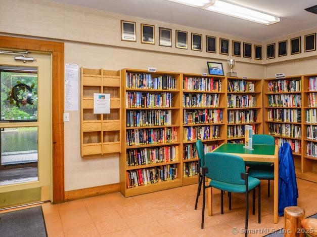 172 Old Farms Rd Unit 172, Torrington, CT 06790 - sitting room featuring bookshelves