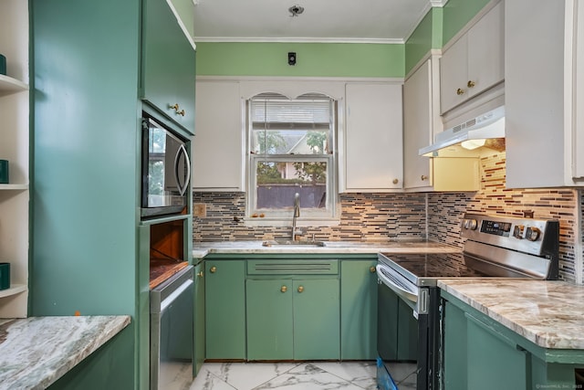73 Atwater St, Bridgeport, CT 06604 - kitchen with appliances with stainless steel finishes, light marble finish flooring, light countertops, decorative backsplash, and crown molding