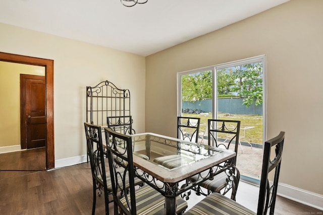 73 Atwater St, Bridgeport, CT 06604 - dining room featuring dark wood-style floors and baseboards