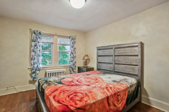 73 Atwater St, Bridgeport, CT 06604 - bedroom featuring radiator heating unit and wood finished floors