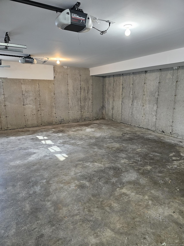 26 Roger Ave, Danbury, CT 06810 - garage featuring a garage door opener