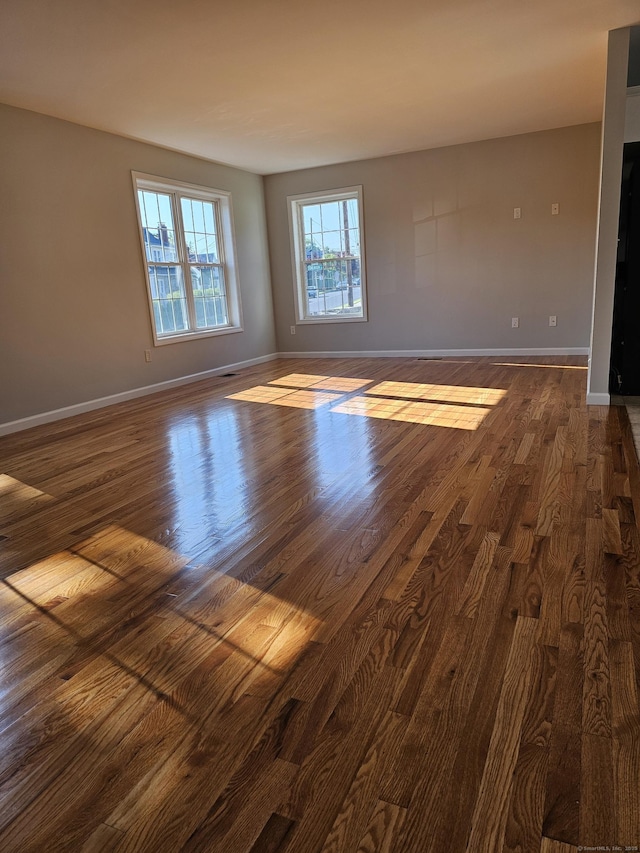 26 Roger Ave, Danbury, CT 06810 - empty room featuring dark wood-style flooring