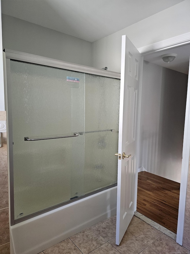26 Roger Ave, Danbury, CT 06810 - bathroom featuring tile patterned flooring and shower / bath combination with glass door