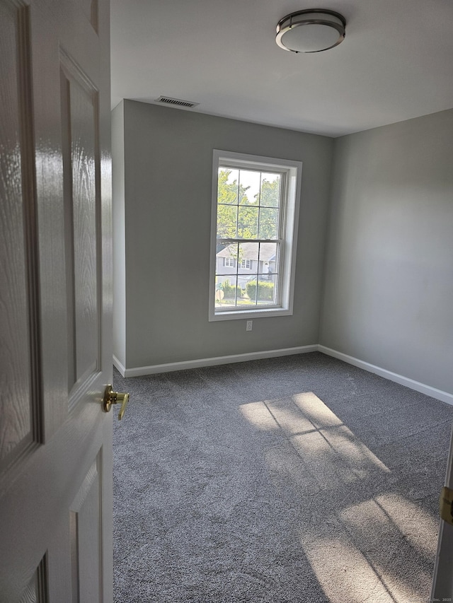26 Roger Ave, Danbury, CT 06810 - unfurnished room with carpet floors and baseboards