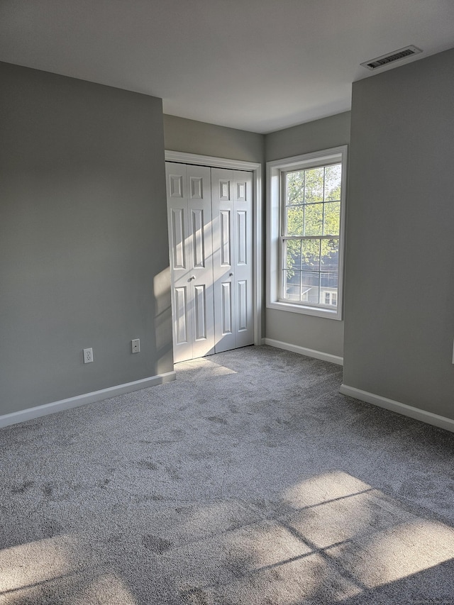26 Roger Ave, Danbury, CT 06810 - unfurnished bedroom featuring carpet and a closet
