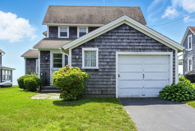 226 Old Kelsey Point Rd, Westbrook, CT 06498 - view of front of home featuring driveway, roof with shingles, a garage, and a front lawn