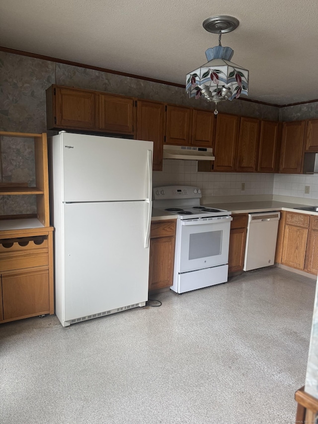 260 Scott Rd Apt 1, Waterbury, CT 06705 - kitchen featuring white appliances, under cabinet range hood, wallpapered walls, light countertops, and brown cabinets