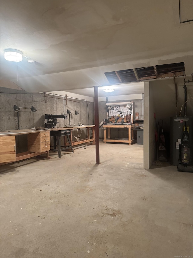 260 Scott Rd Apt 1, Waterbury, CT 06705 - below grade area featuring a workshop area and water heater
