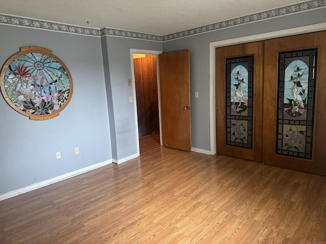 260 Scott Rd Apt 1, Waterbury, CT 06705 - entryway featuring wood finished floors and baseboards