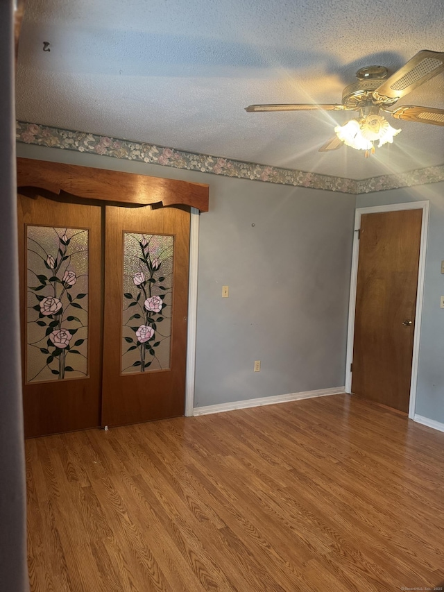 260 Scott Rd Apt 1, Waterbury, CT 06705 - foyer entrance with a ceiling fan, wood finished floors, and a textured ceiling