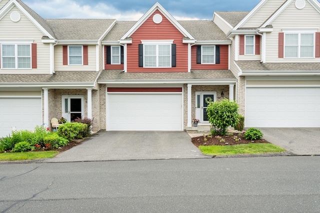 90 Bridlewood Ln Unit 90, Vernon, CT 06066 - townhome / multi-family property featuring an attached garage, driveway, and a shingled roof