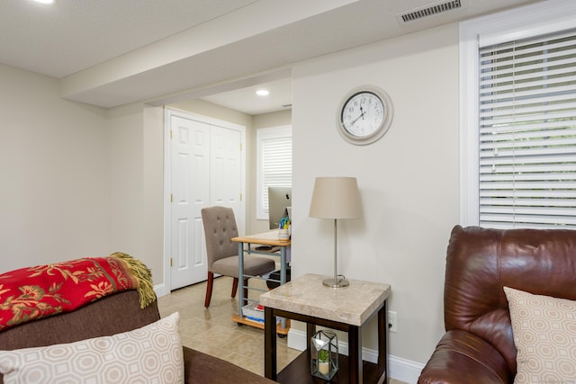 90 Bridlewood Ln Unit 90, Vernon, CT 06066 - tiled living area with recessed lighting and baseboards