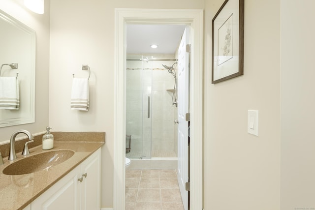 90 Bridlewood Ln Unit 90, Vernon, CT 06066 - bathroom with vanity, a stall shower, and tile patterned floors