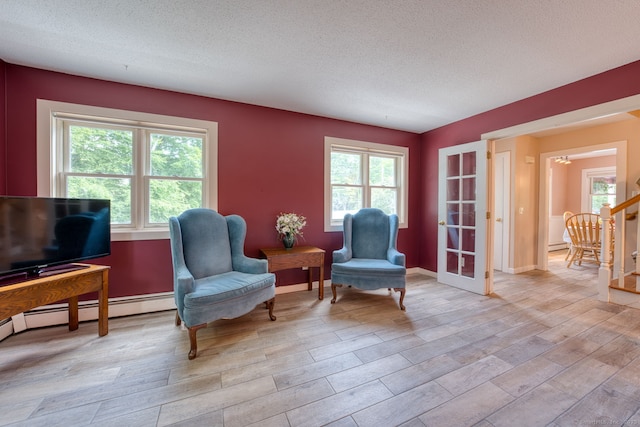 43 Rte 87, Columbia, CT 06237 - sitting room featuring light wood finished floors and a textured ceiling