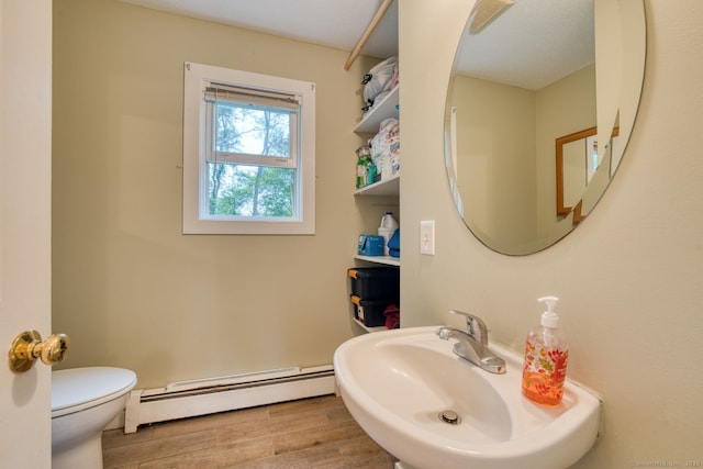 43 Rte 87, Columbia, CT 06237 - half bath with a baseboard heating unit and wood finished floors