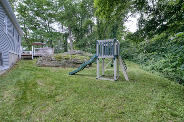 43 Rte 87, Columbia, CT 06237 - view of green lawn featuring a playground and a wooden deck