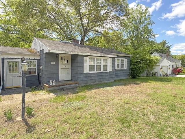 520 River Rd, Lisbon, CT 06351 - bungalow with a chimney and a front yard