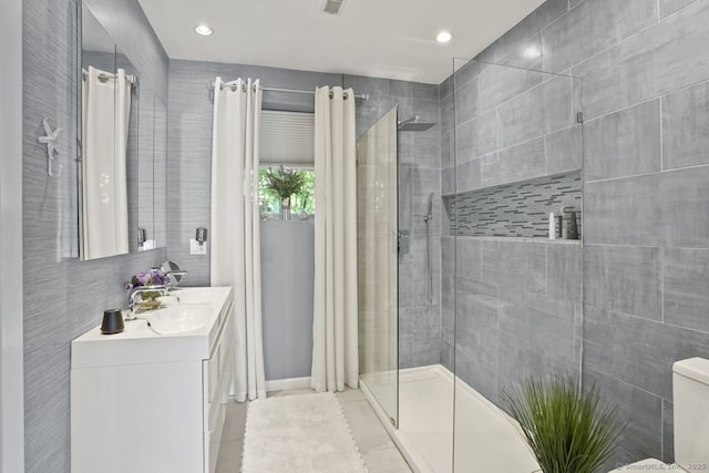 296 Black Rock Tpke, Redding, CT 06896 - full bathroom featuring a shower stall, vanity, recessed lighting, and tile walls