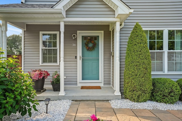 36 Ernest Ave, Waterbury, CT 06708 - doorway to property featuring a porch and a shingled roof