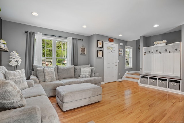 36 Ernest Ave, Waterbury, CT 06708 - living room with healthy amount of natural light, light wood-type flooring, recessed lighting, and stairway
