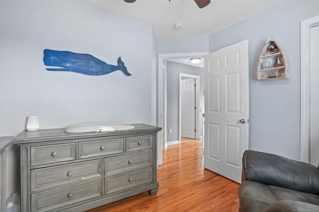 36 Ernest Ave, Waterbury, CT 06708 - living area with ceiling fan and light wood-style floors