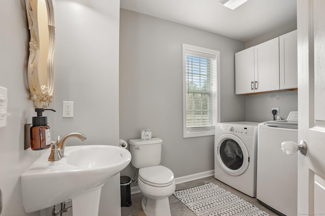 36 Ernest Ave, Waterbury, CT 06708 - bathroom with washer and dryer and baseboards