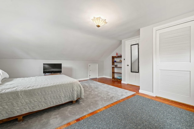376 Glenwood Avenue Extension, Waterford, CT 06385 - bedroom with wood finished floors, vaulted ceiling, and a closet