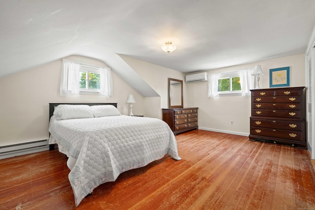 376 Glenwood Avenue Extension, Waterford, CT 06385 - bedroom featuring a wall mounted AC, a baseboard heating unit, wood finished floors, and lofted ceiling