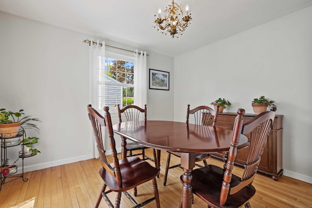 376 Glenwood Avenue Extension, Waterford, CT 06385 - dining space with a chandelier and light wood-style floors