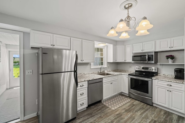 376 Glenwood Avenue Extension, Waterford, CT 06385 - kitchen featuring stainless steel appliances, white cabinets, dark wood-type flooring, and a chandelier
