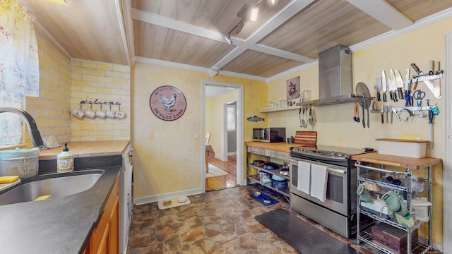 166 Catherine St, Hartford, CT 06106 - kitchen with appliances with stainless steel finishes, wall chimney exhaust hood, wooden counters, dark stone finish floors, and a wooden ceiling with exposed beams