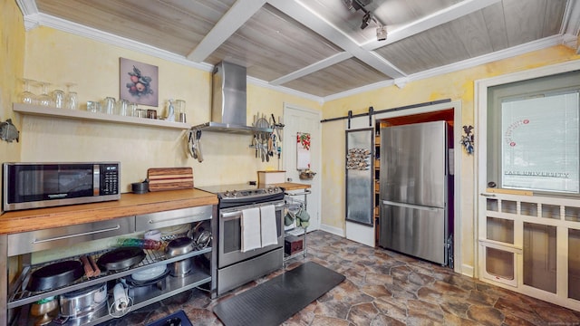 166 Catherine St, Hartford, CT 06106 - kitchen featuring appliances with stainless steel finishes, wall chimney exhaust hood, dark stone finish flooring, a barn door, and ornamental molding
