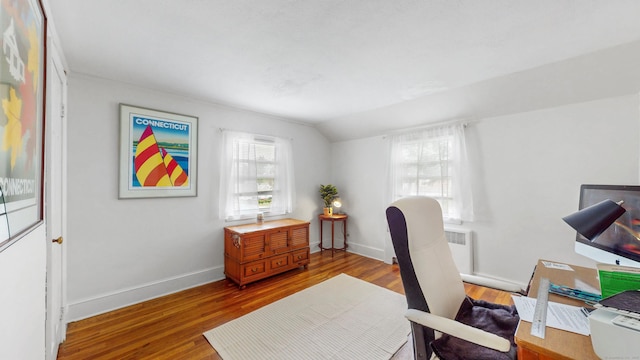 166 Catherine St, Hartford, CT 06106 - office area featuring wood finished floors, radiator heating unit, and lofted ceiling
