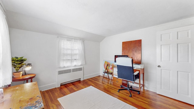 166 Catherine St, Hartford, CT 06106 - home office with radiator heating unit, wood finished floors, and vaulted ceiling