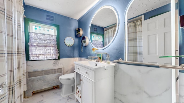 166 Catherine St, Hartford, CT 06106 - full bathroom with vanity, marble look tiles, tile walls, and a wainscoted wall