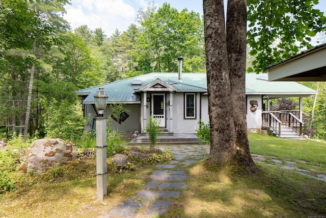 48 Preston Ln, Salisbury, CT 06068 - view of front of property featuring a metal roof and a front lawn