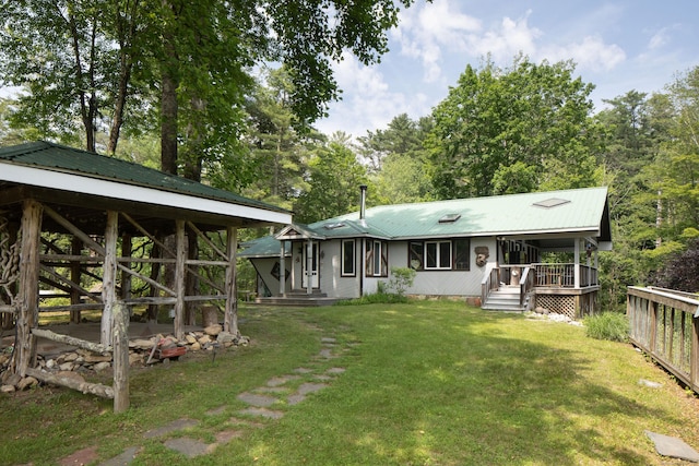 48 Preston Ln, Salisbury, CT 06068 - rear view of house with a metal roof and a lawn