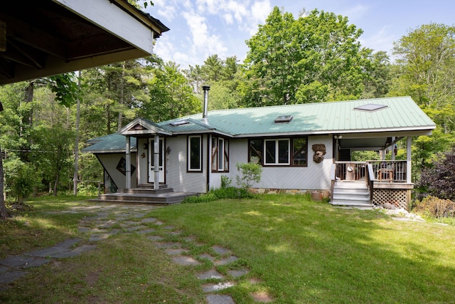 48 Preston Ln, Salisbury, CT 06068 - view of front facade featuring a front yard, a metal roof, and a porch