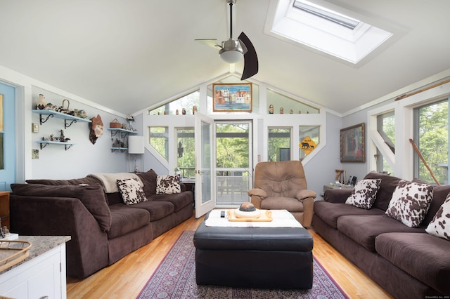48 Preston Ln, Salisbury, CT 06068 - living room with ceiling fan, a skylight, vaulted ceiling, light wood-type flooring, and ornamental molding