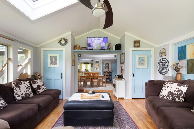 48 Preston Ln, Salisbury, CT 06068 - living area with light wood finished floors, a ceiling fan, a skylight, and vaulted ceiling
