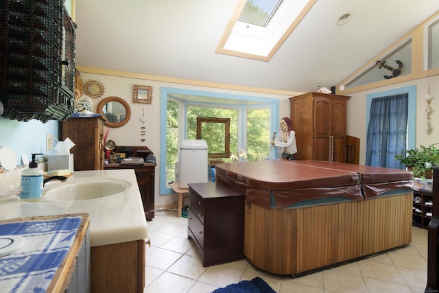 48 Preston Ln, Salisbury, CT 06068 - kitchen with vaulted ceiling, light tile patterned flooring, and a skylight