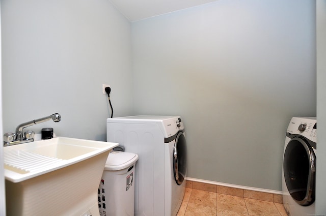 1 Leghorn Ln, Cromwell, CT 06416 - laundry room with separate washer and dryer and light tile patterned floors