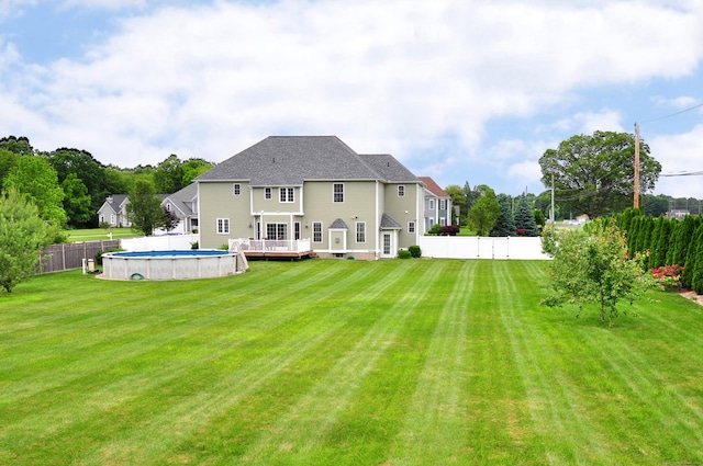 1 Leghorn Ln, Cromwell, CT 06416 - back of house featuring a wooden deck and a fenced backyard