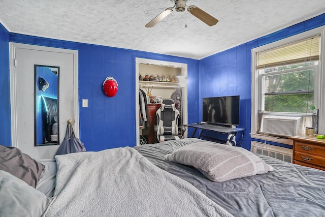84 Hickory St, West Haven, CT 06516 - bedroom with a textured ceiling, cooling unit, a closet, a ceiling fan, and a spacious closet