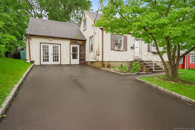 84 Hickory St, West Haven, CT 06516 - view of front of house with french doors and a front lawn